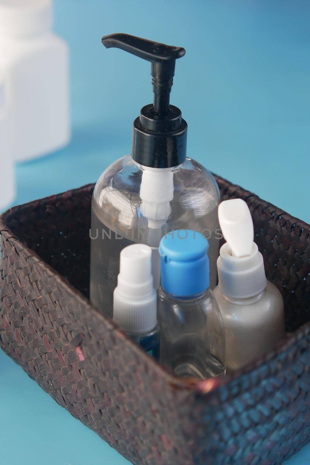close up of many hand sanitizer in a box on table by towfiq007