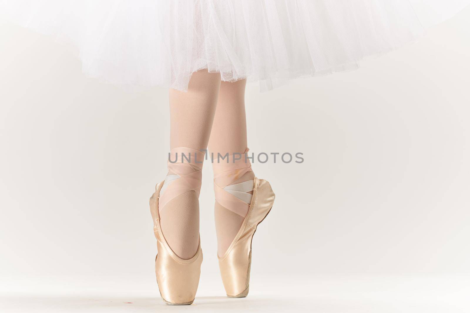 ballet shoes dance performed classical style light background. High quality photo