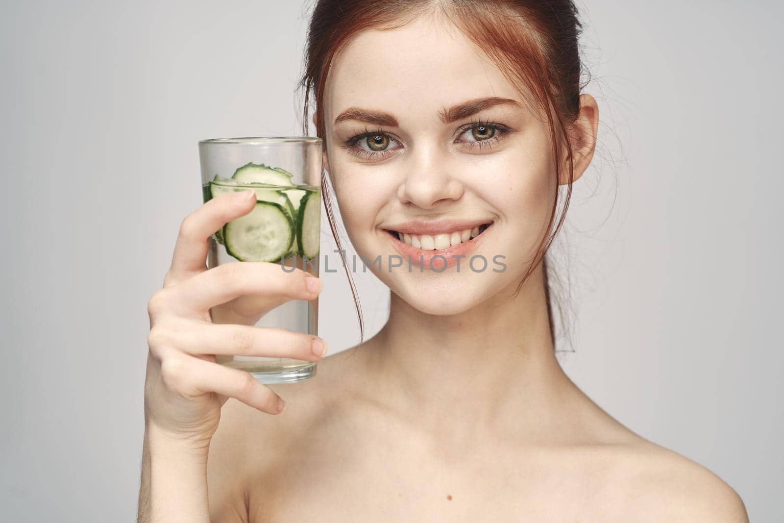 woman with bare shoulders cucumber health drink Fresh by Vichizh