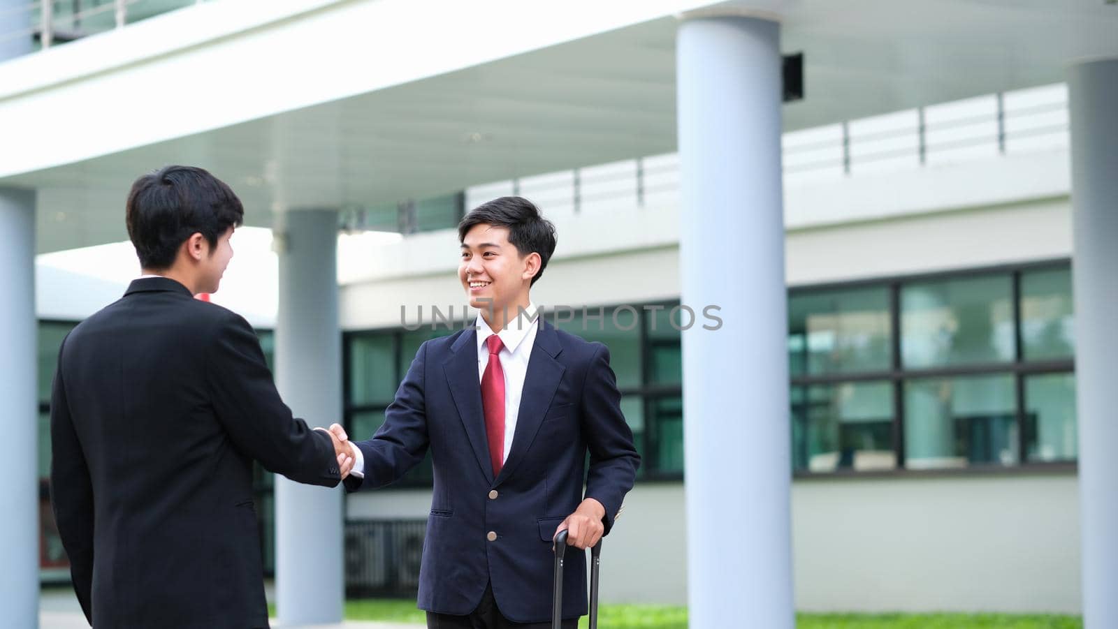 Businessmans handshake after good deal. by ijeab