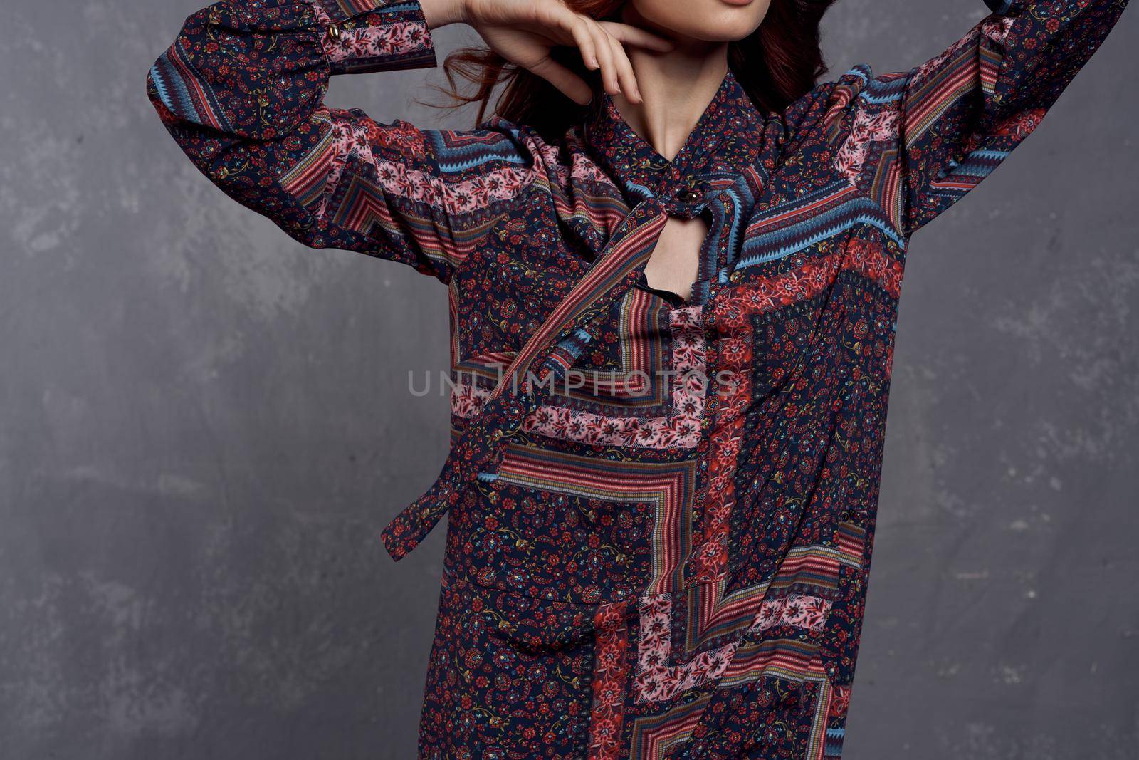 woman in coat fashionable clothes glamor red hair model. High quality photo
