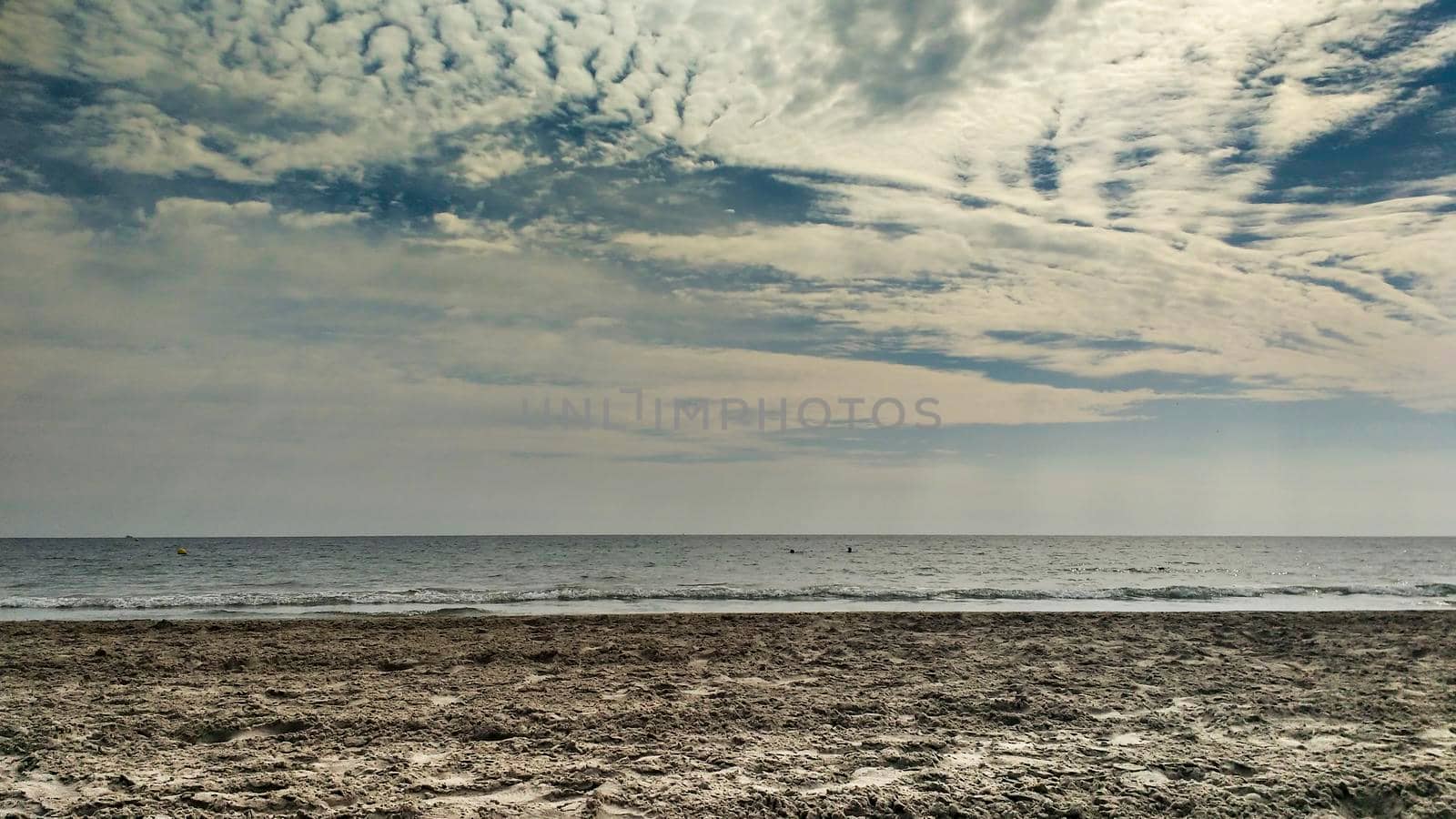 Colorful sunset on the beach in Autumn in Santa Pola, Alicante, Spain