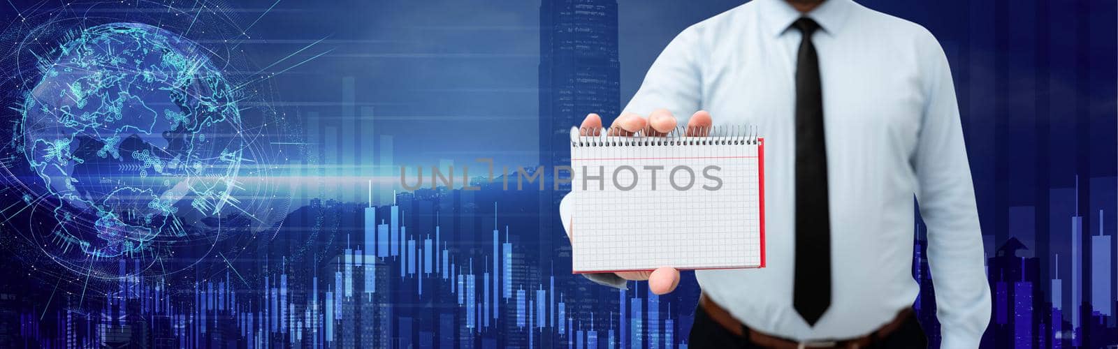 Picture Of Businessman Holding Empty Page Graphing Notebook Around Futuristic Technology. Employee Presenting Blank Workbook Surrounded By Modern Automation. by nialowwa