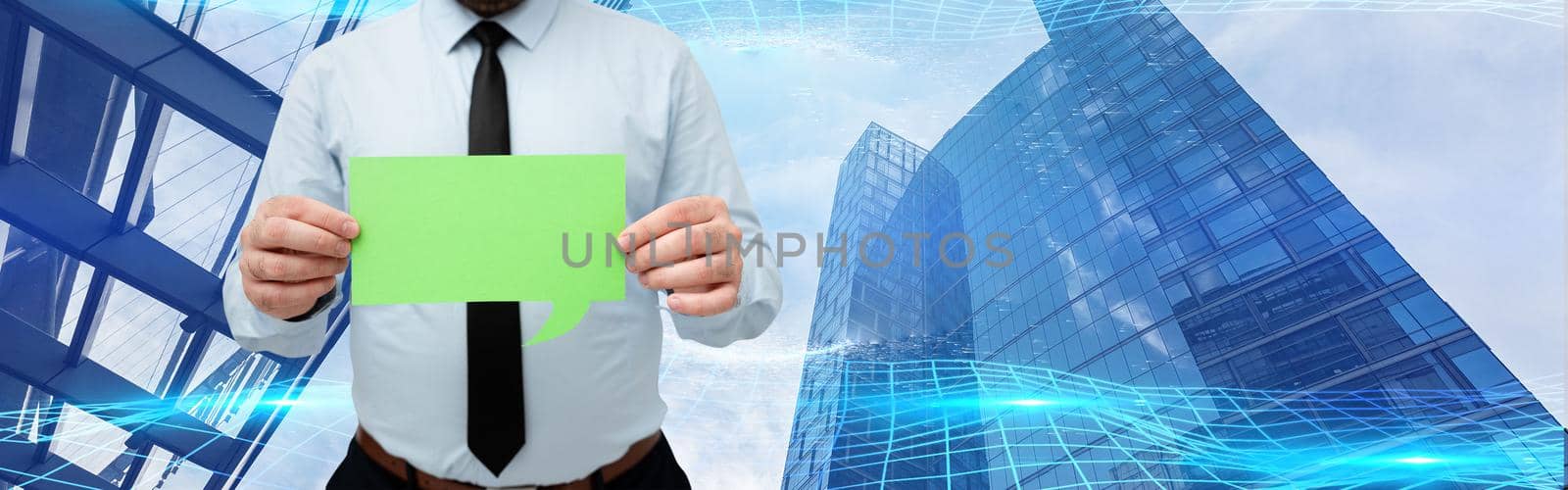 Businessman Holding Chat Box With Both Hands Around Futuristic Technology.