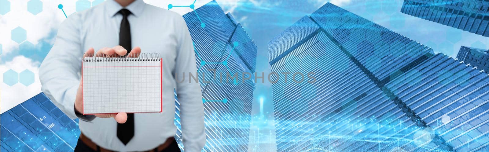 Man Wearing Black Tie Holding Empty Page Graphing Notebook Around Futuristic Technology. Employee Presenting Blank Workbook Surrounded By Modern Automation. by nialowwa