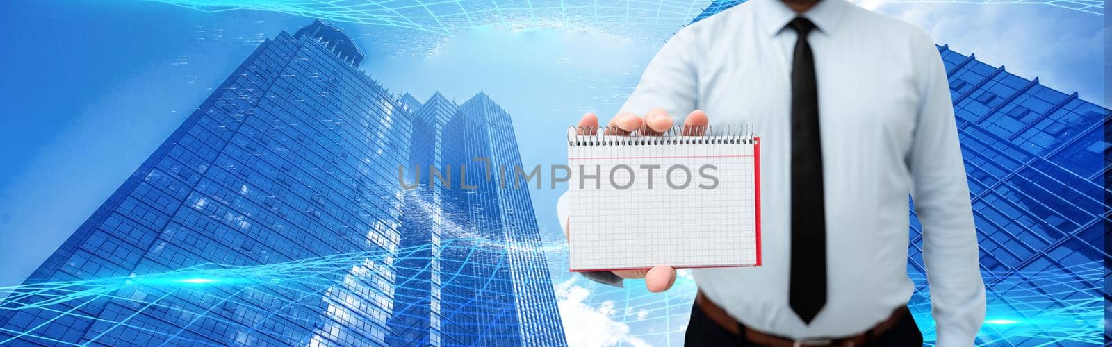 Picture Of Businessman Holding Empty Page Graphing Notebook Around Futuristic Technology. Employee Presenting Blank Workbook Surrounded By Modern Automation. by nialowwa