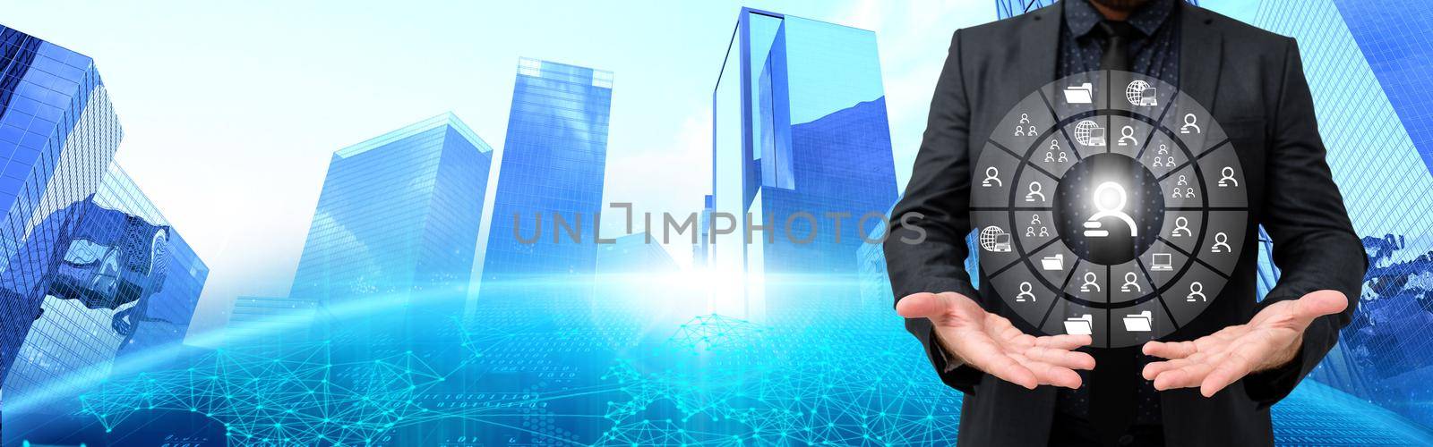 Businessman Presenting With Both Open Hands Showing Futuristic Technology.