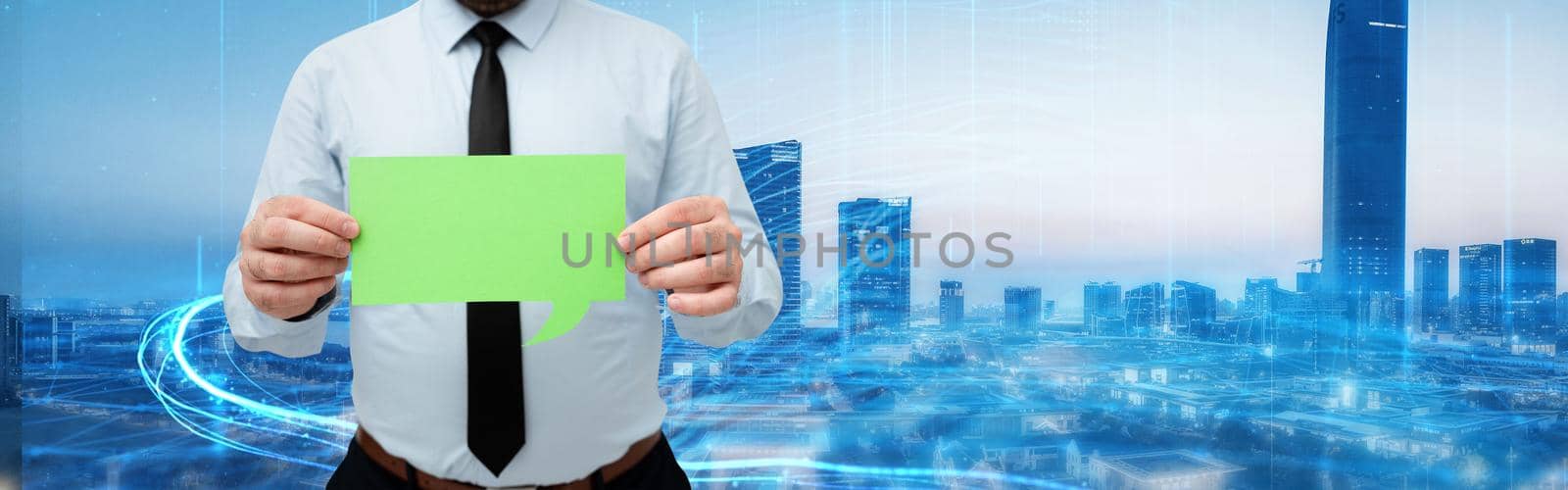 Businessman Holding Chat Box With Both Hands Around Futuristic Technology.