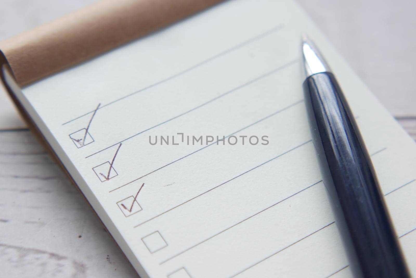 Completed items with checkboxes on a white background. Place for your text. High quality photo