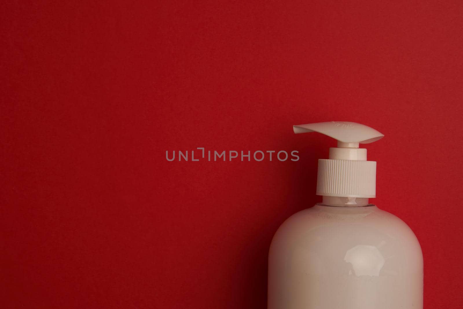 soap bath supplies hygiene body care red background. High quality photo