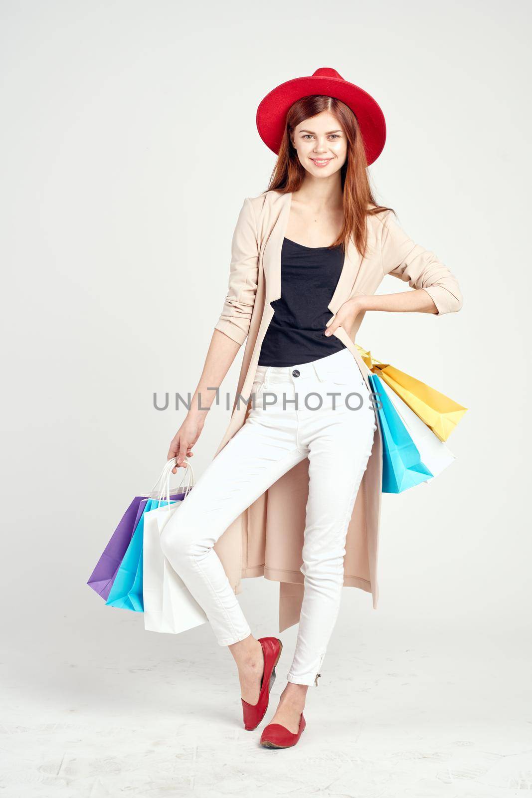 beautiful woman attractive look shopping smile light background. High quality photo