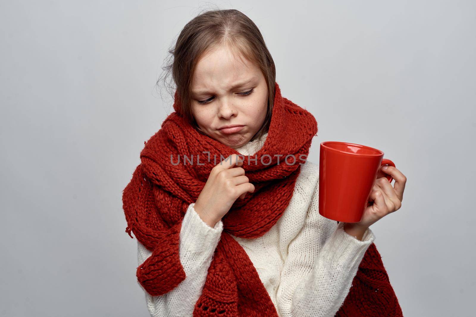 girl with a cold covered herself with a blanket health problems flu by Vichizh