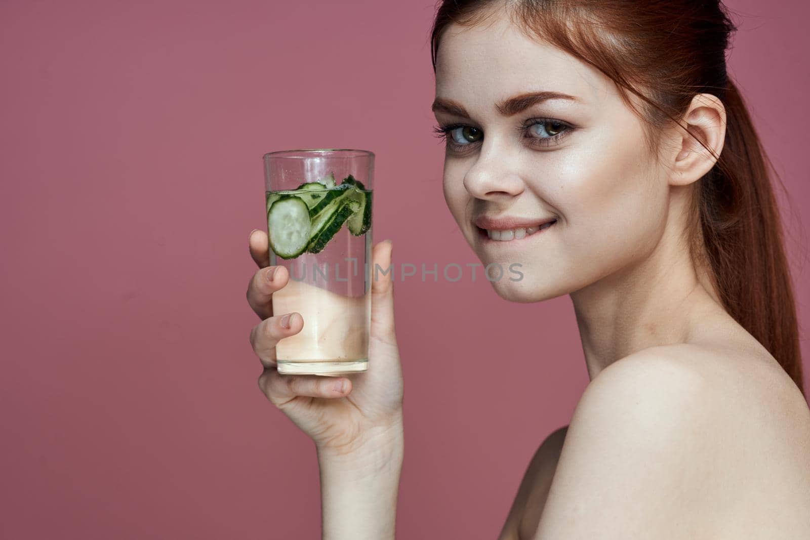 pretty woman with cucumber drink vitamins health beauty by Vichizh