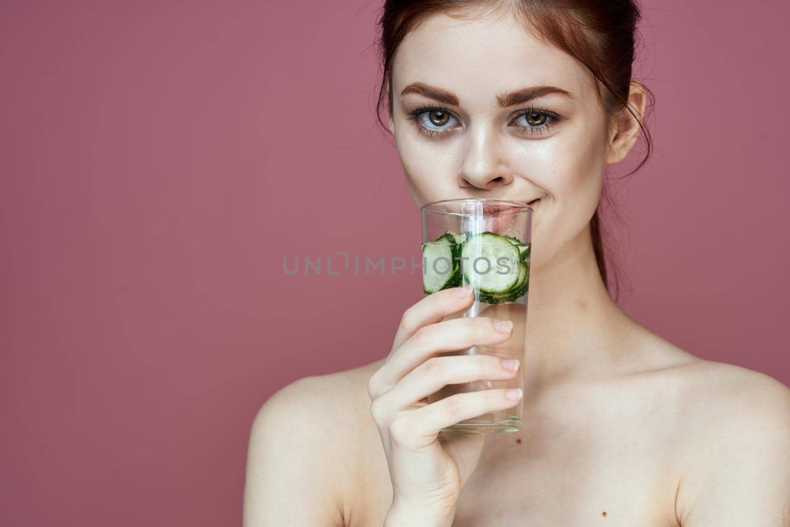 pretty woman with cucumber drink vitamins health beauty by Vichizh