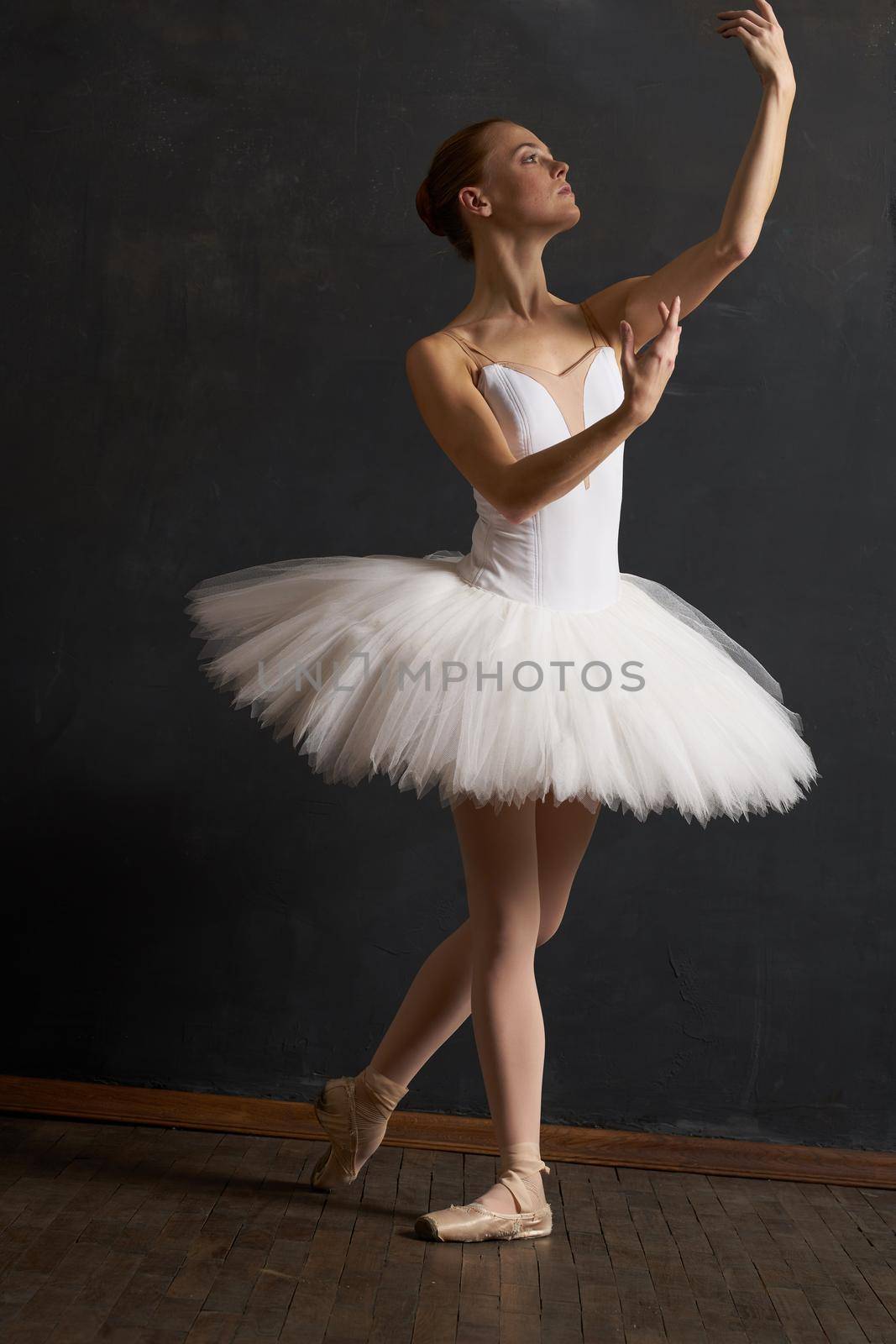 woman ballerina in white tutu performance grace dance. High quality photo