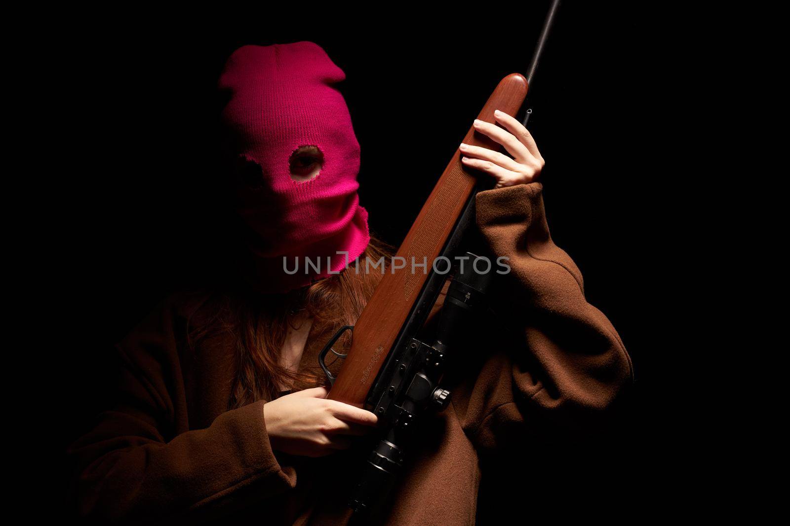 woman grandstage danger the gun posing Military. High quality photo