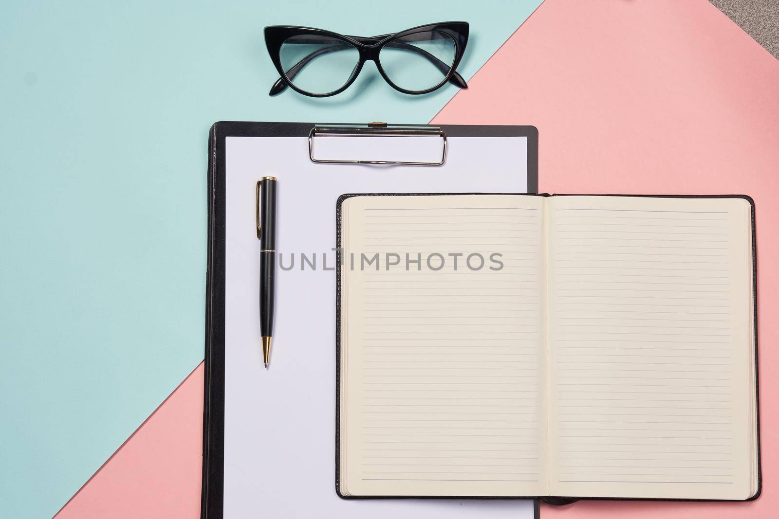 folder for papers office accessories notepad colorful background business tools. High quality photo