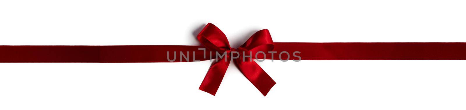 Red bow on white background by Yellowj