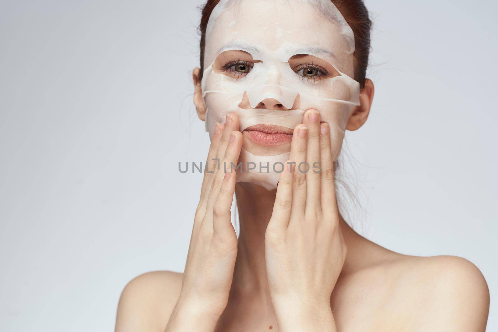 woman in cosmetic mask facial skin care rejuvenation. High quality photo