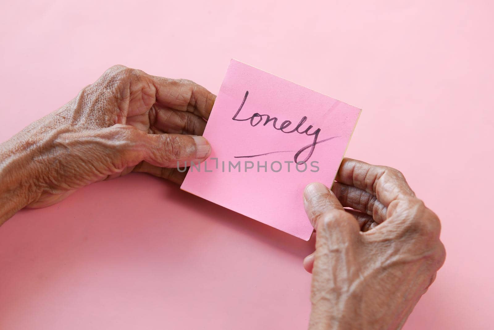 senior women hand hold lonely text .
