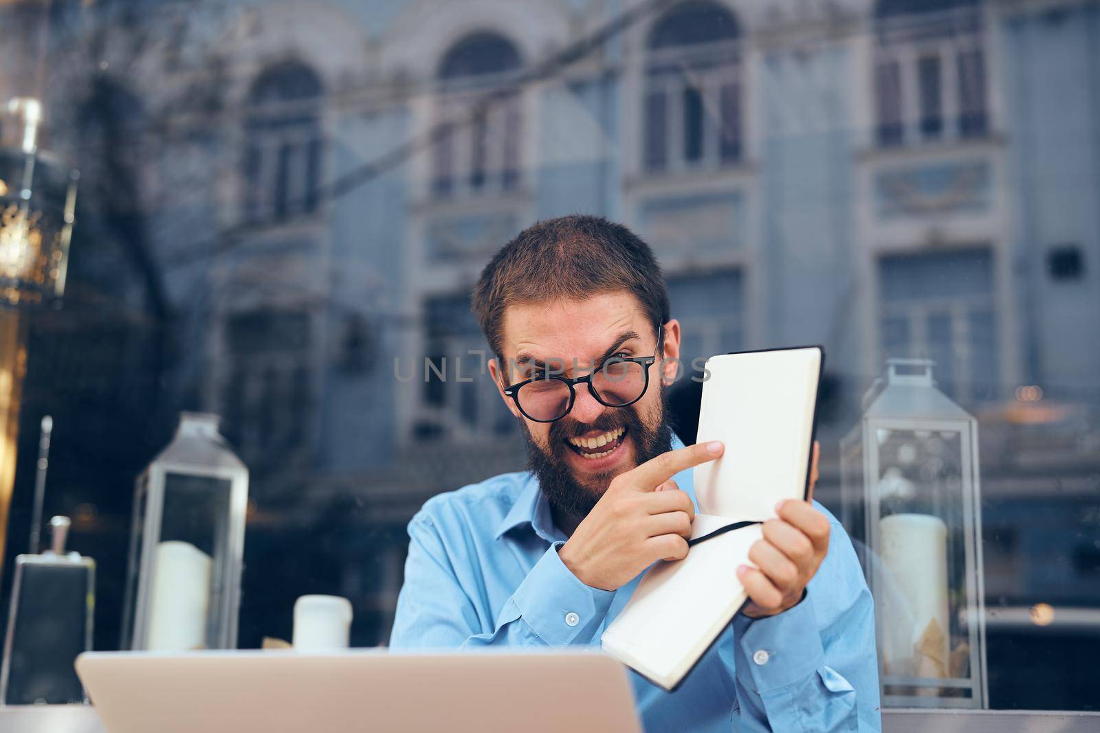 business man on the street with laptop work communication. High quality photo