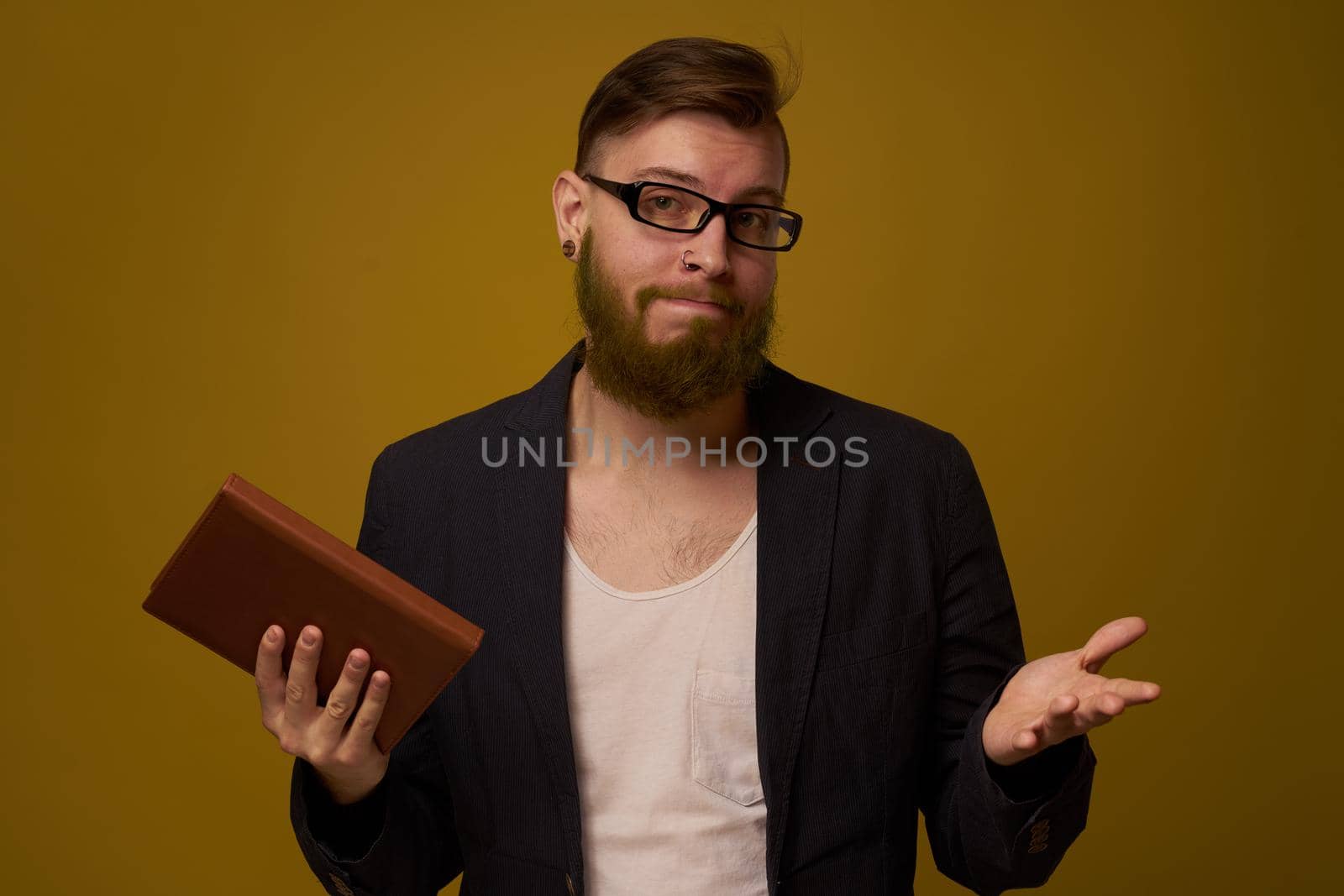 business man with glasses notepad in the hands of a studio official by Vichizh