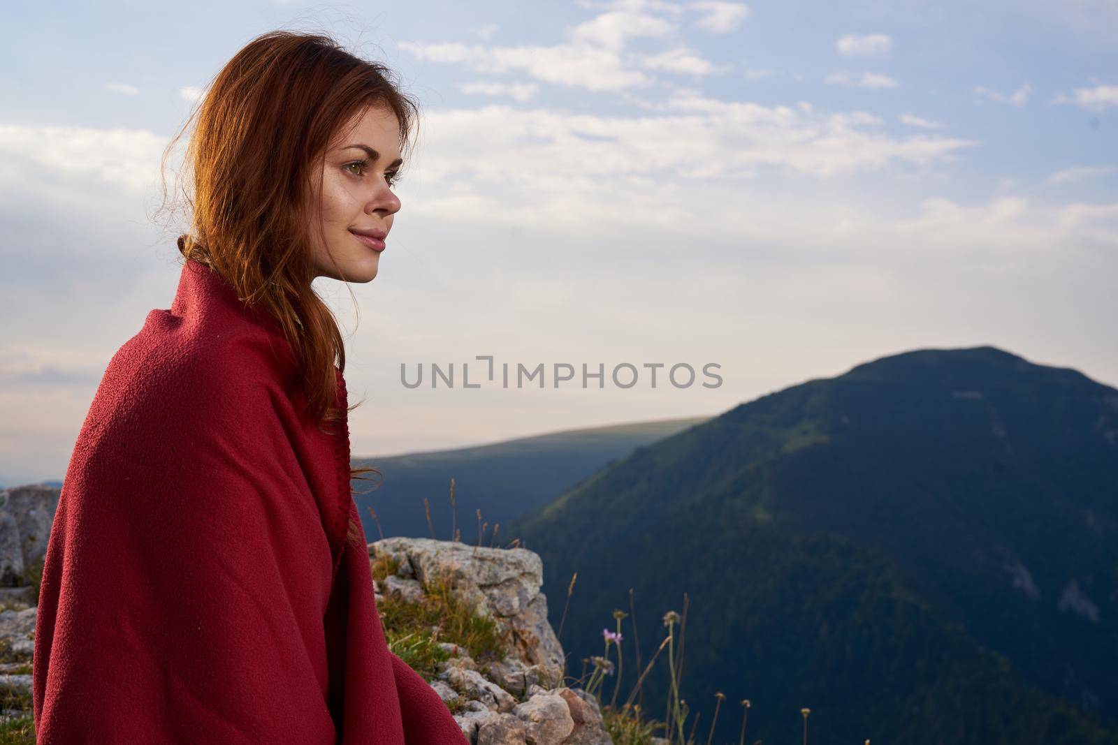 woman with red plaid on nature in the mountains vacation adventure by Vichizh