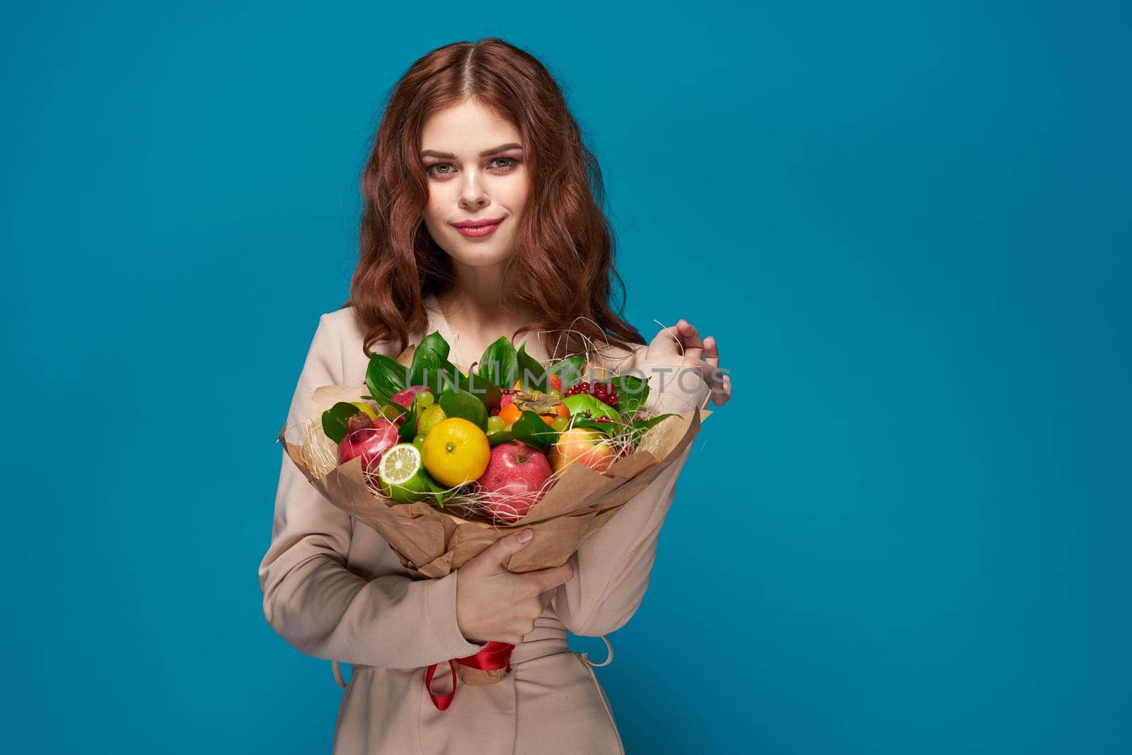 beautiful woman smile posing fruit bouquet vitamins colorful background. High quality photo