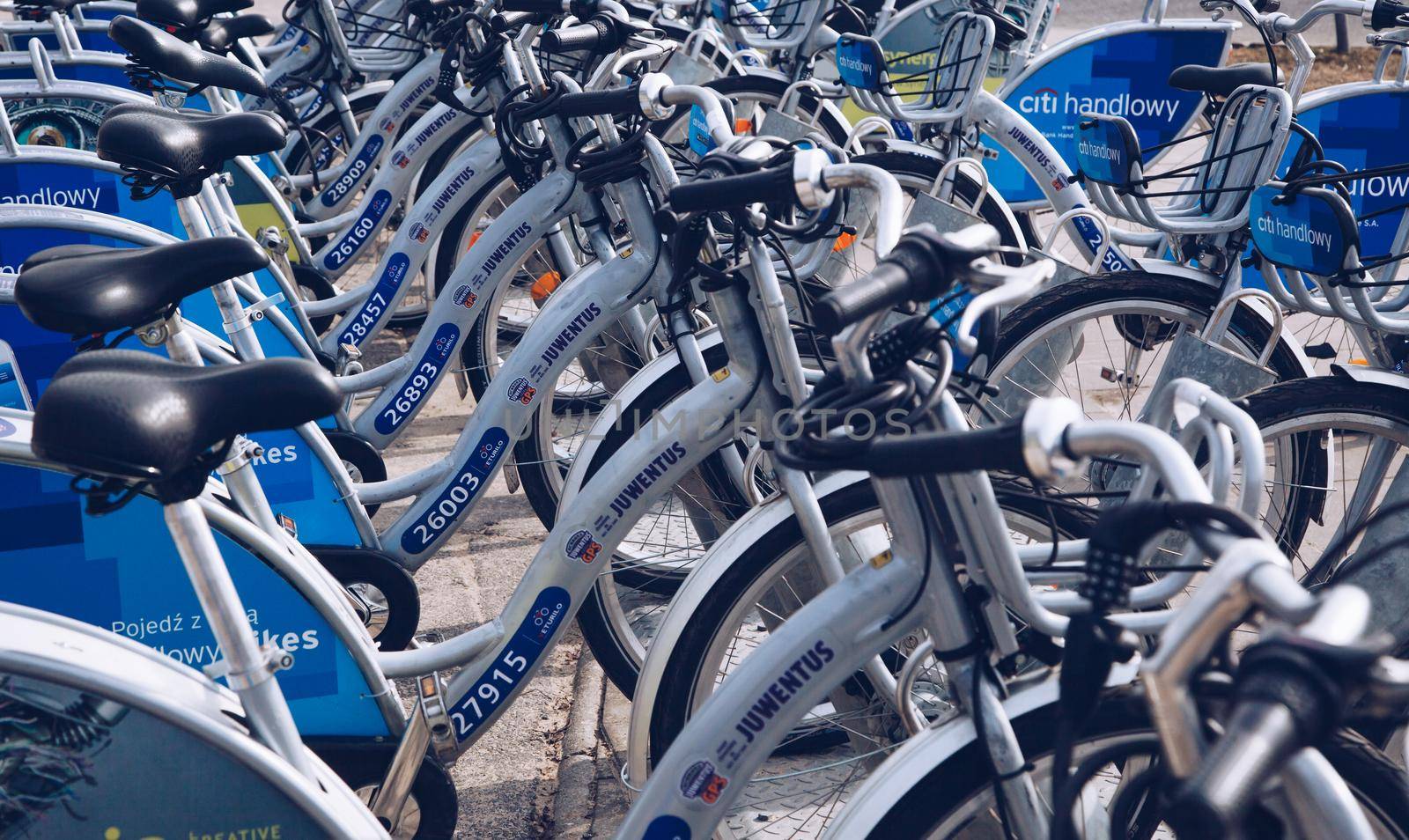 WARSAW, POLAND - March 2018 - Group of rental bikes standing in center city of Warsaw