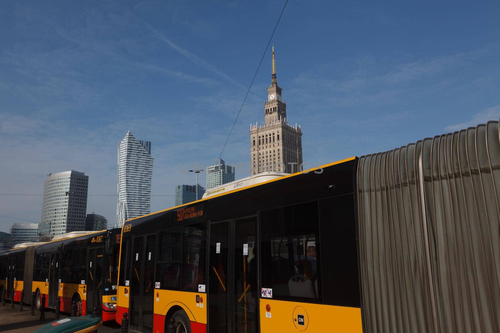 WARSAW, POLAND - Mar, 2018 Palace of Culture and Science and bus on the foreground - public transportation.