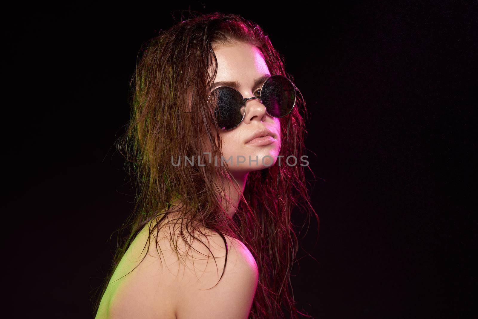 woman model hairstyle fashion naked shoulders makeup studio lifestyle. High quality photo