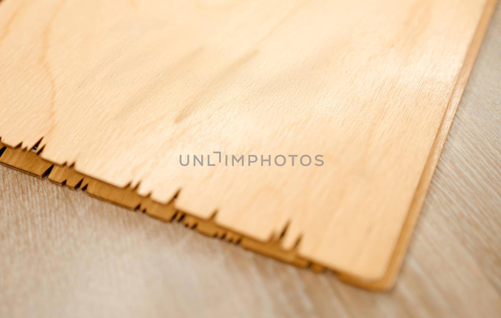 beautiful corner of an empty wooden cover on a light table . High quality photo