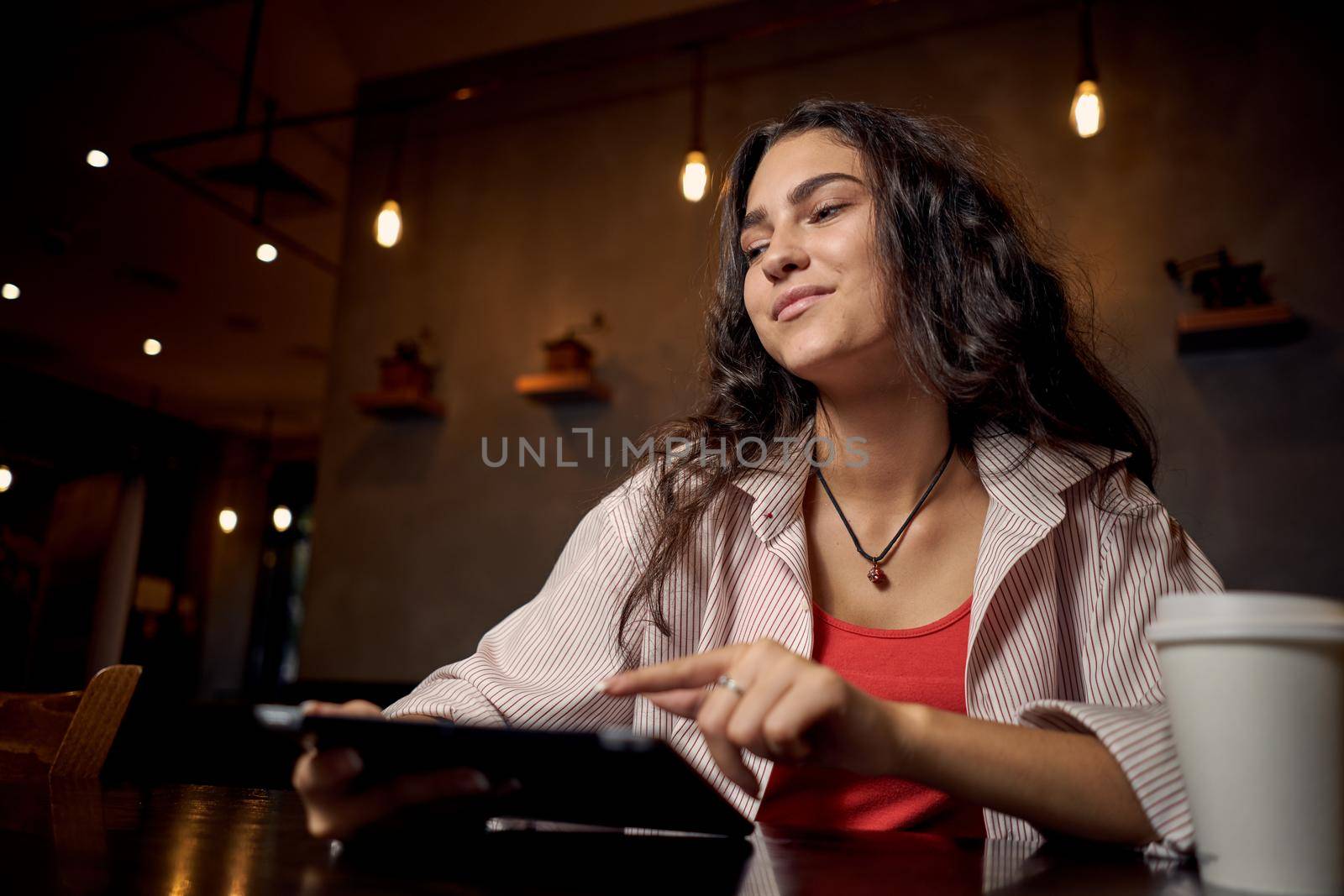 pretty woman sits by the table morning rest breakfast by Vichizh