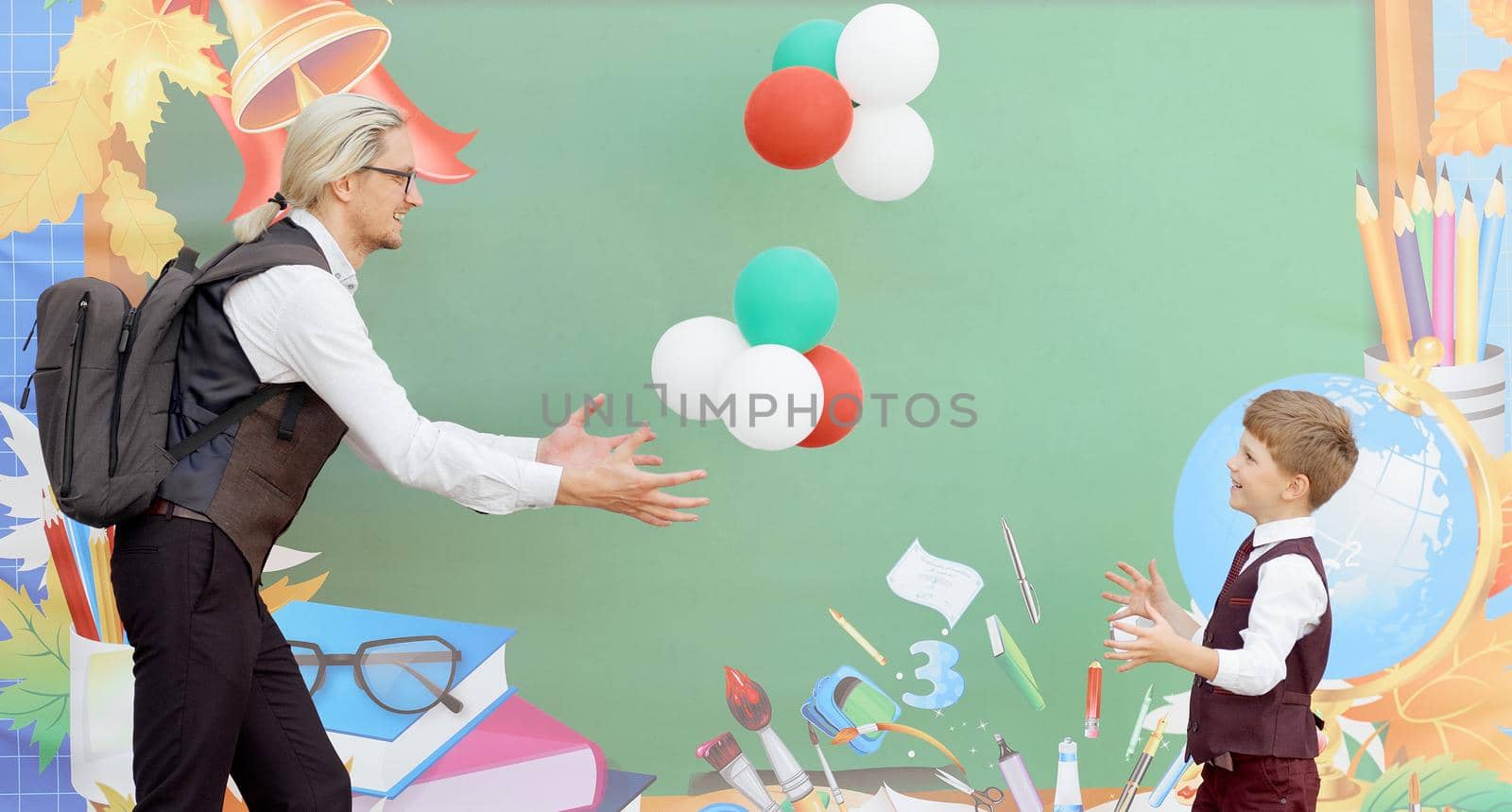 father play with son balloons on school background in first study day  by AntonIlchanka