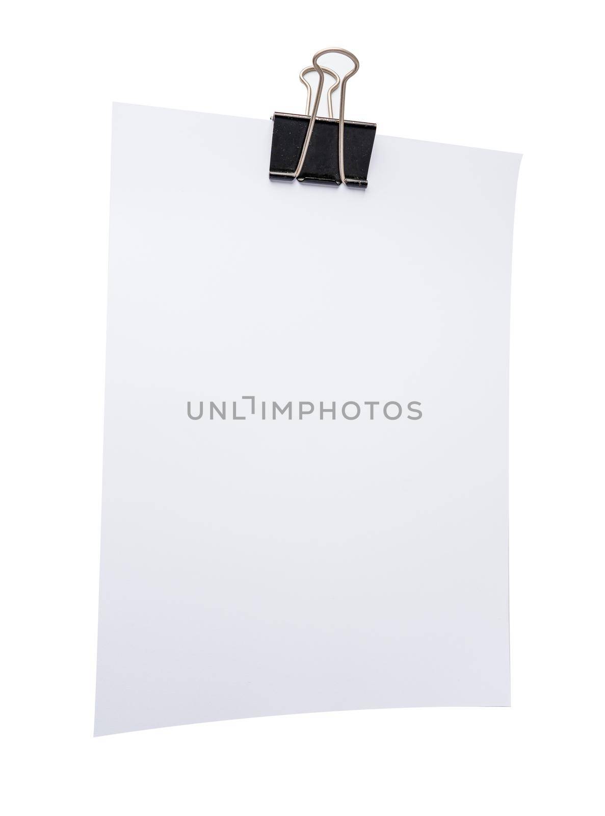 White note paper with paperclip on white background. by pamai