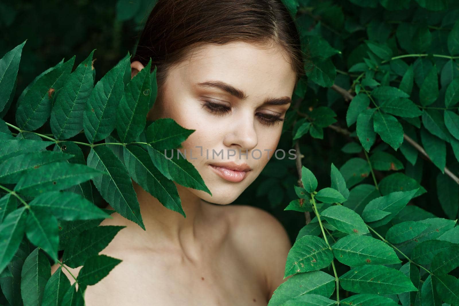 attractive woman green leaves clean skin nature summer model by Vichizh