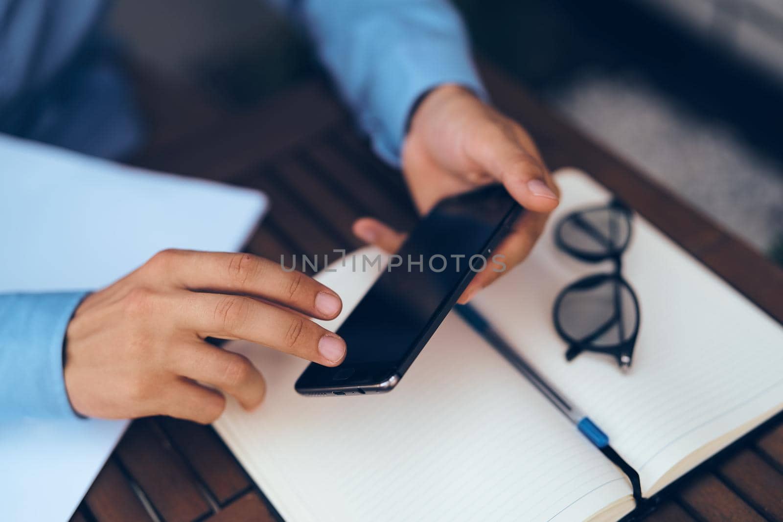 Notepad laptop work in a cafe outdoors. High quality photo