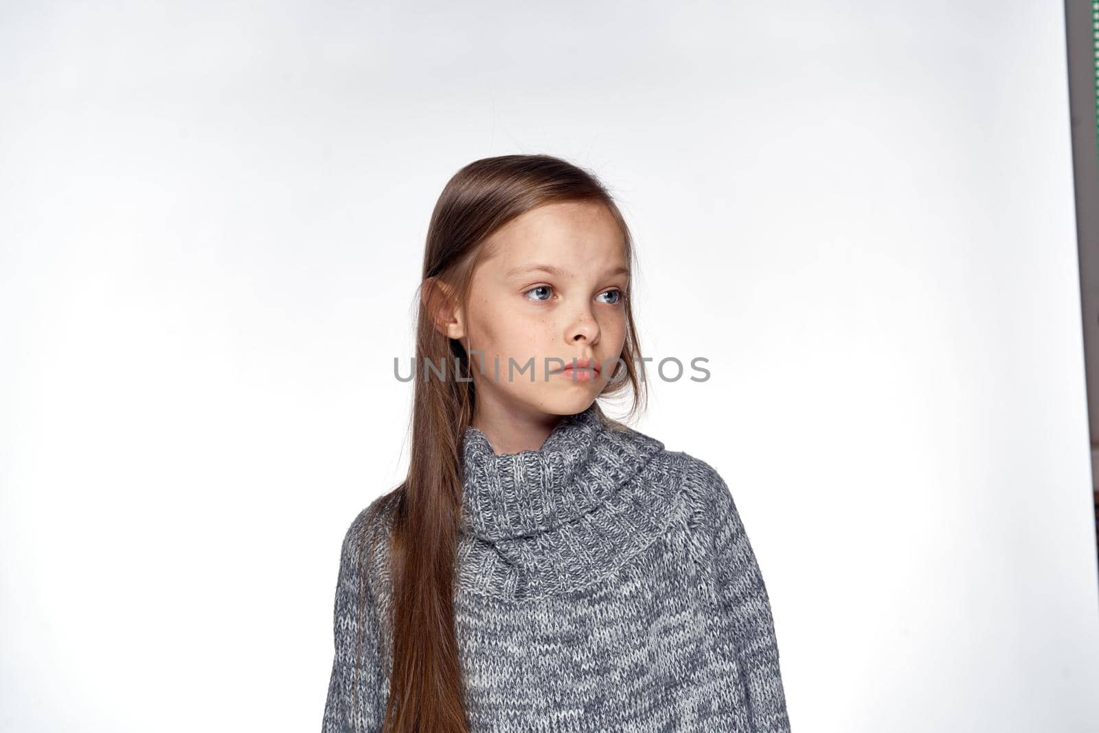 girl in sweater temperature health problems light background by Vichizh