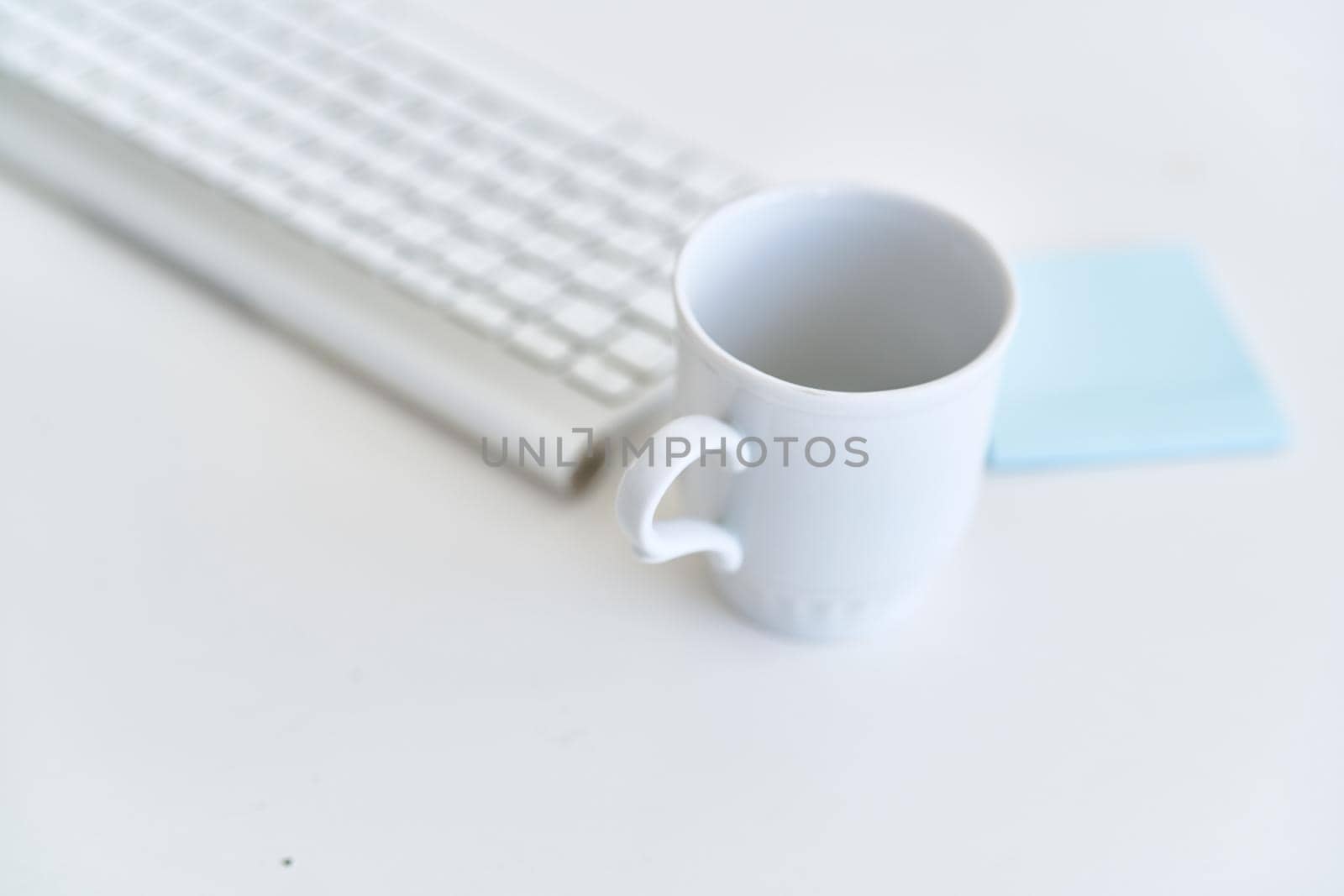 wireless keyboard on desktop cup documents office by Vichizh