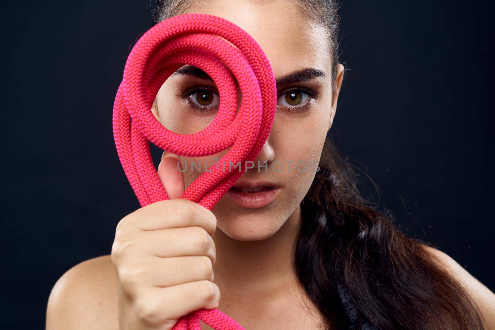 woman athlete fitness workout exercise close-up black background by Vichizh