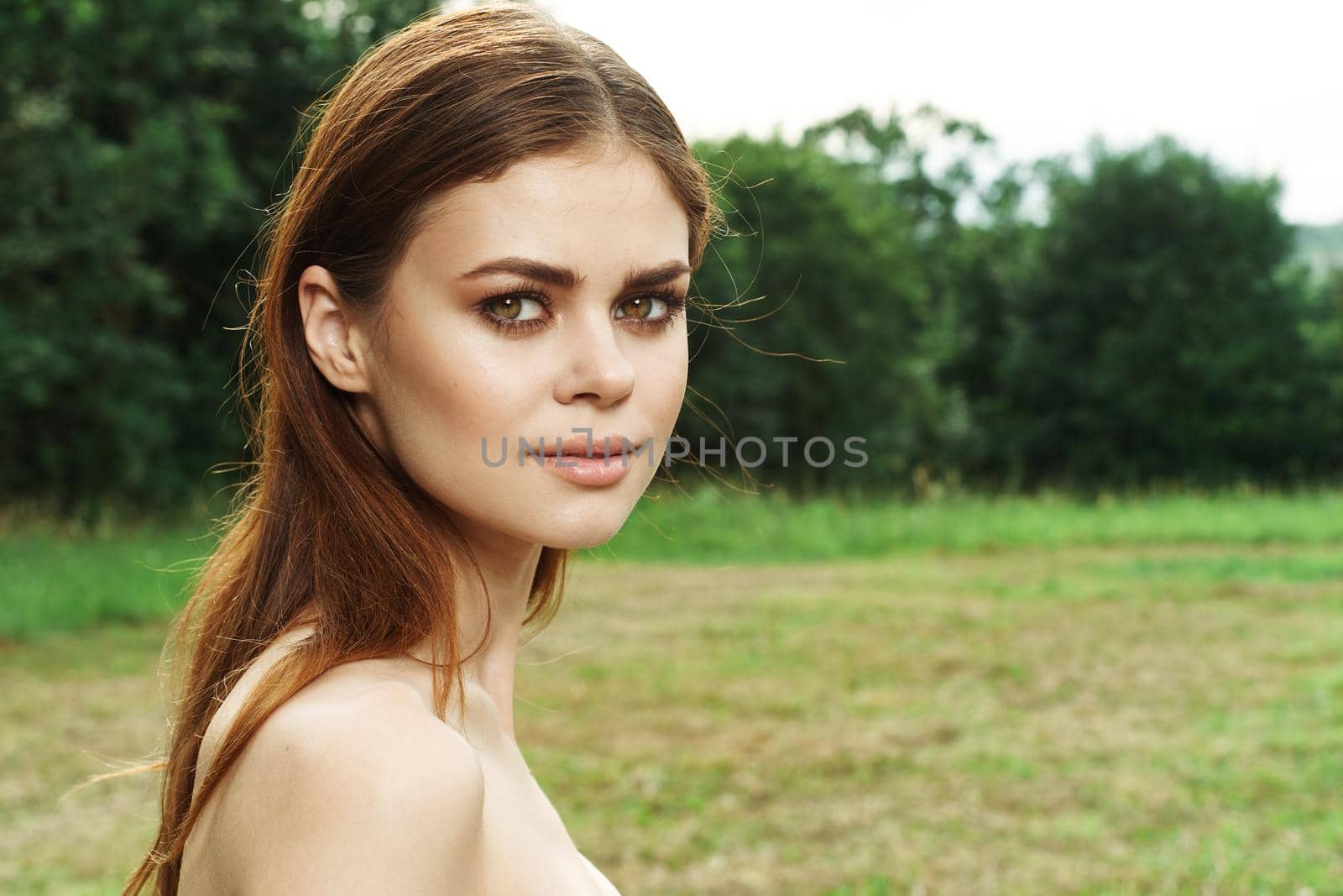 beautiful woman Cosmetology nature green leaves glamor model. High quality photo