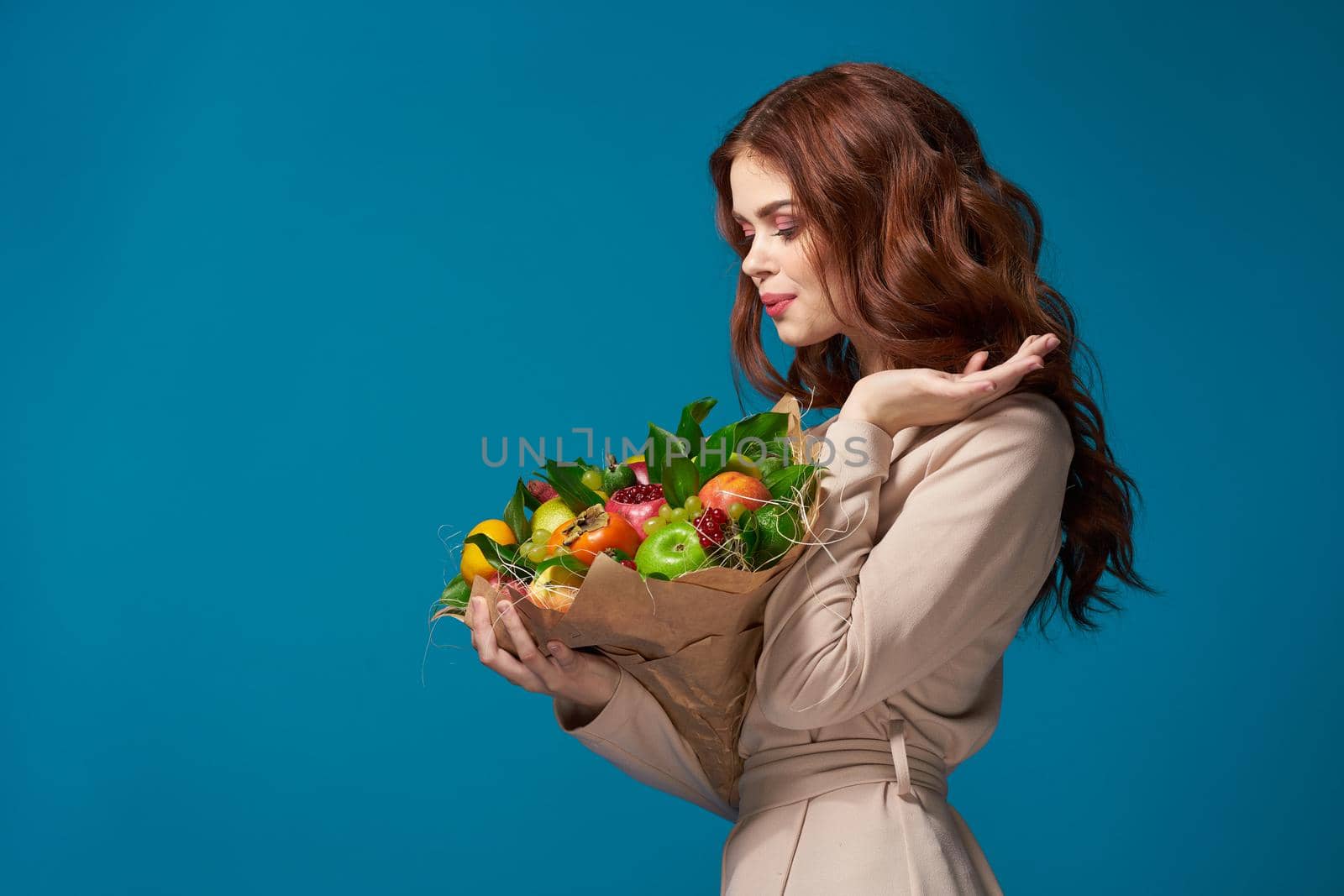 beautiful woman posing fresh fruits bouquet emotions isolated background by Vichizh