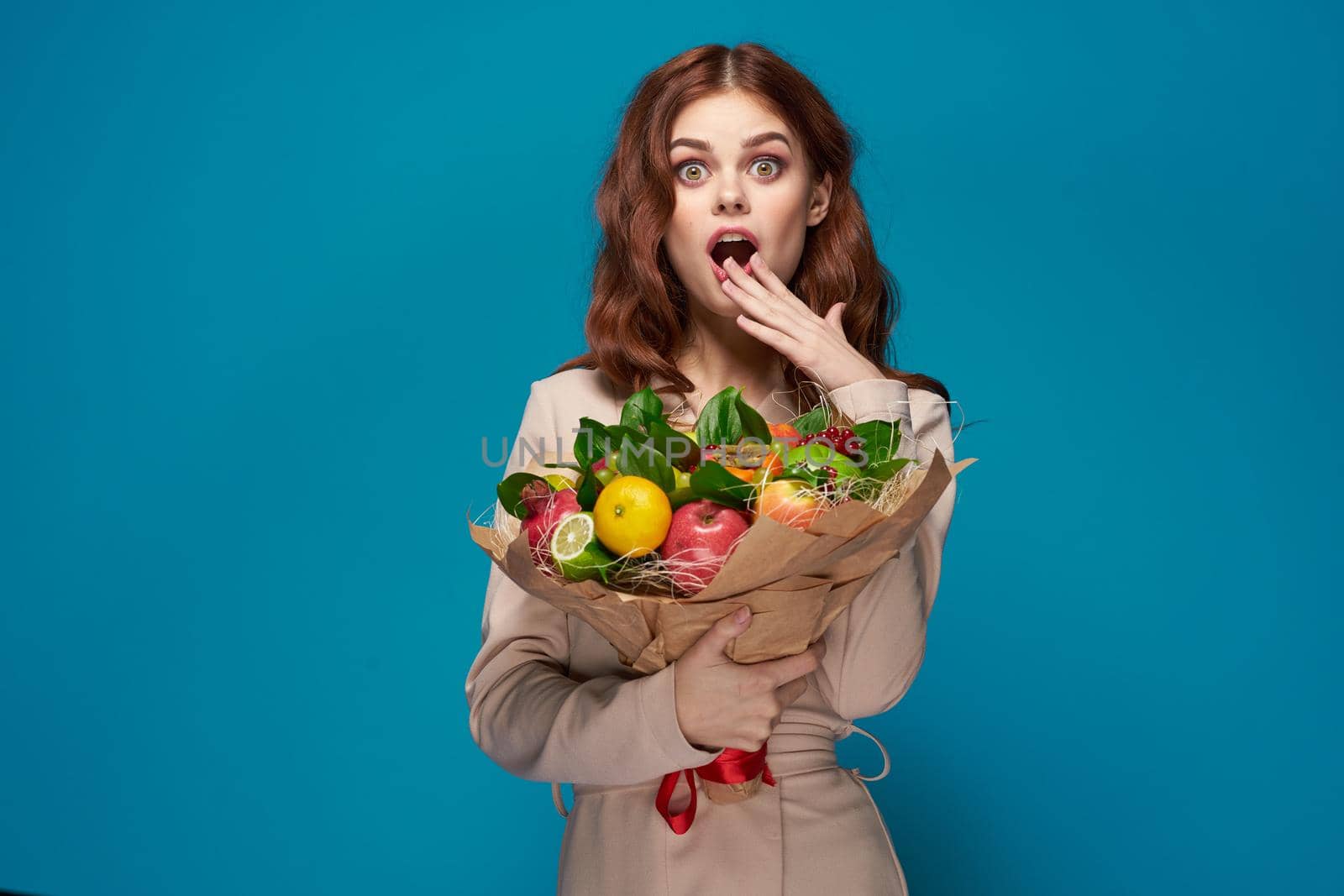 beautiful woman smile posing fruit bouquet vitamins colorful background by Vichizh