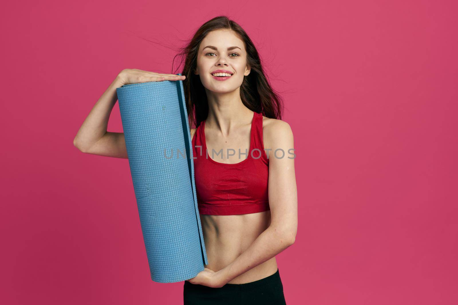 cheerful sportswoman fitness exercise workout isolated background. High quality photo