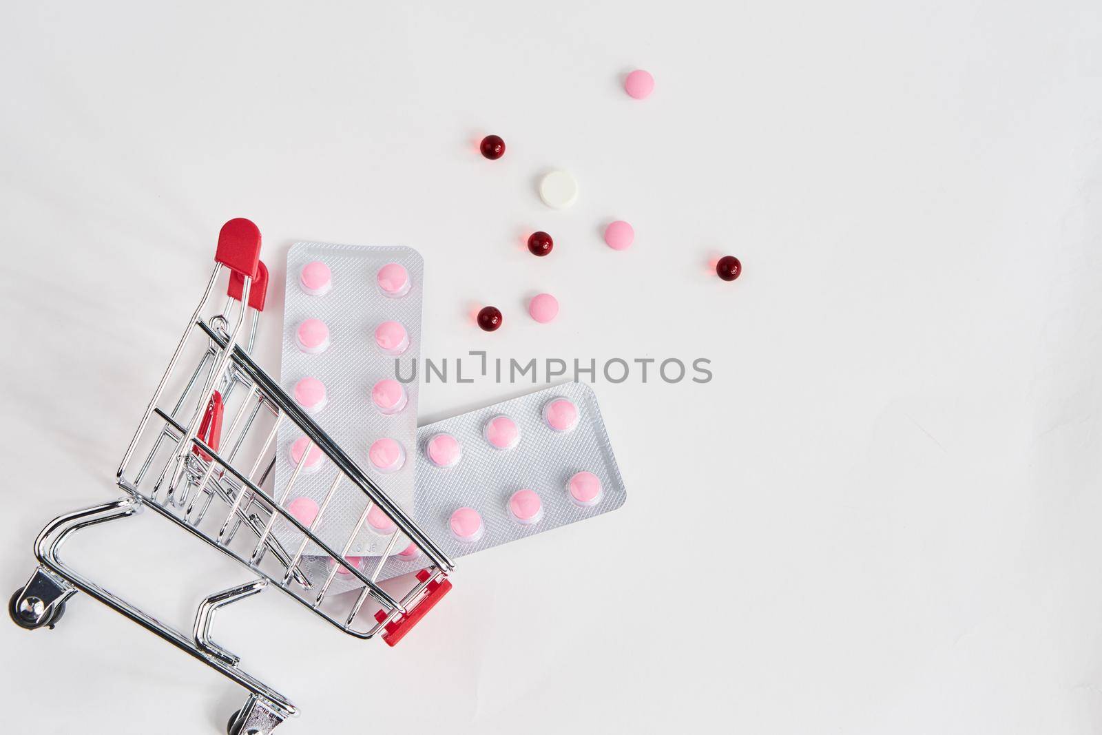 drug trolleys pharmacy shopping light background pharmacy. High quality photo