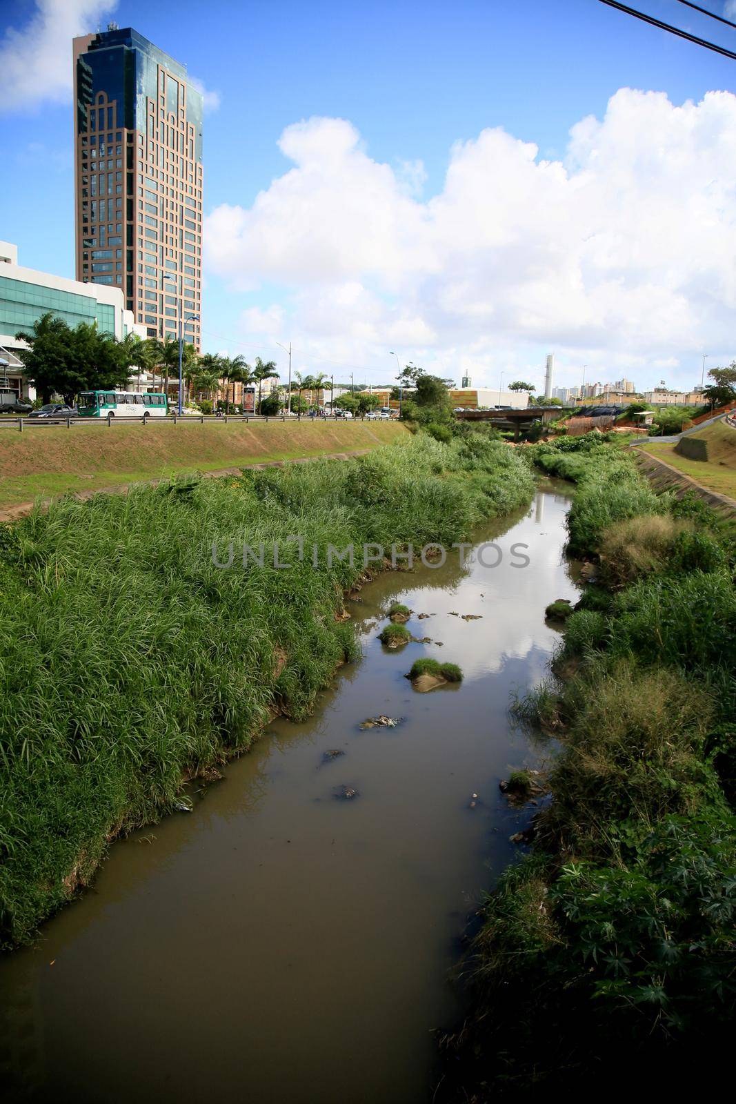 salvador, bahia, brazil - july 20, 2021: view of polluted water channel of sewage network in Rio Camurugipe in the city of Salvador.