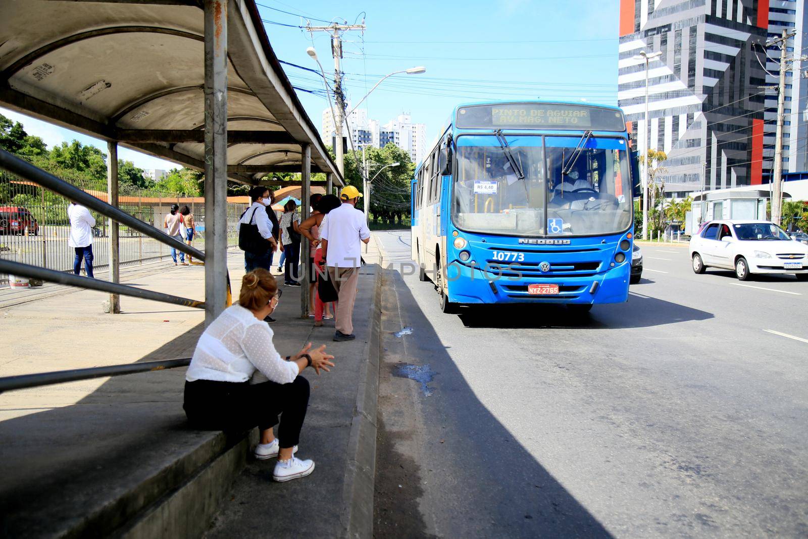  passengers are seen waiting for public transport buses by joasouza