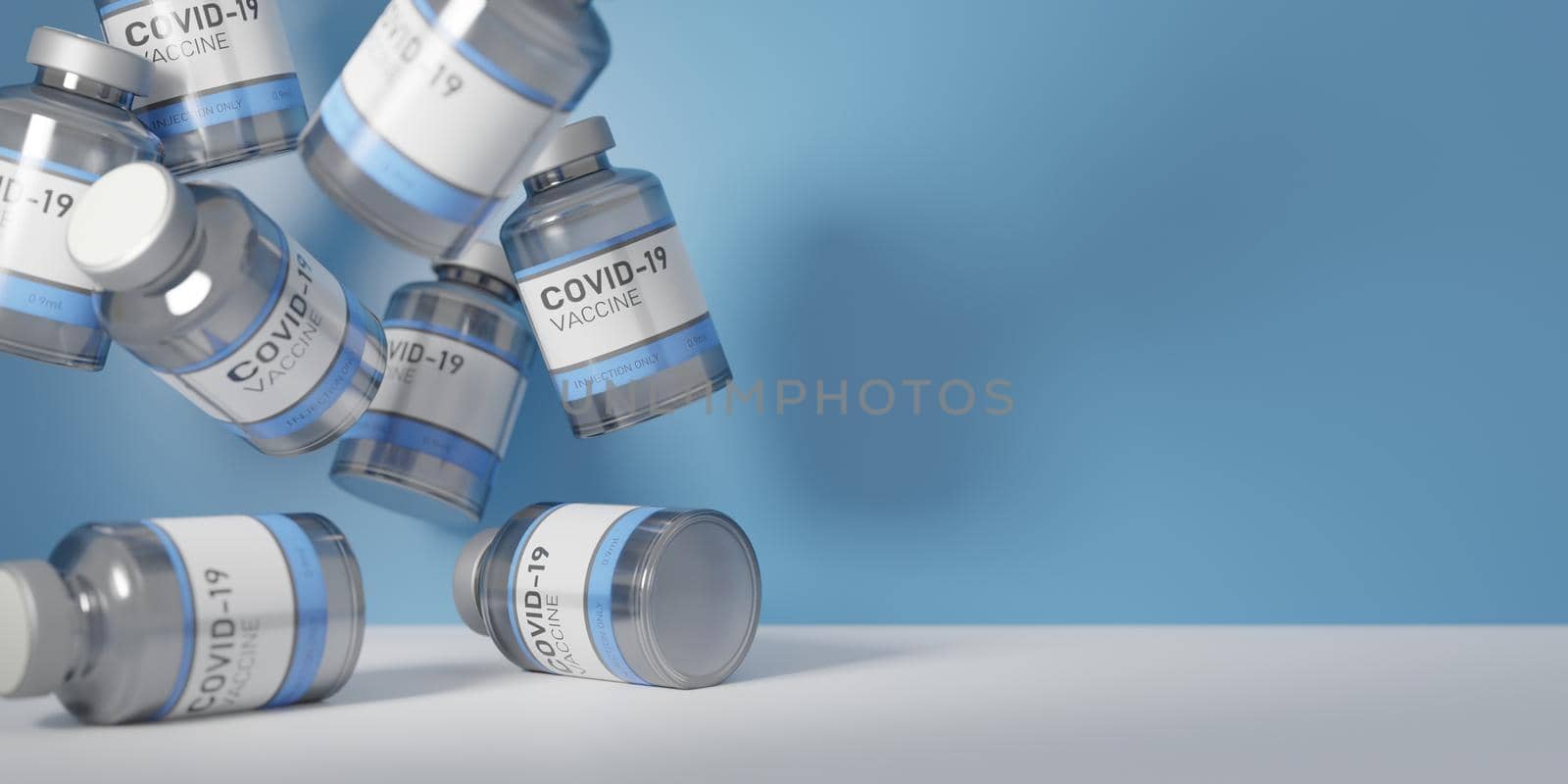 CORONAVIRUS VACCINE CANS FALLING ON WHITE TABLE WITH BLUE BACKGROUND. BANNER
