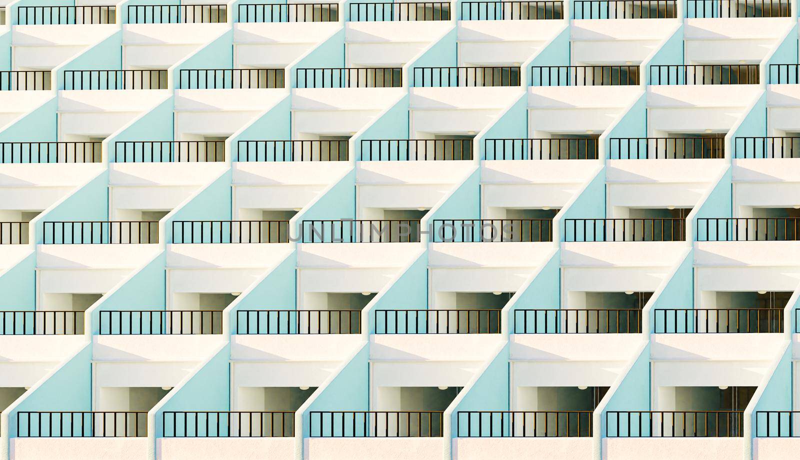 facade of apartments with their terraces by asolano