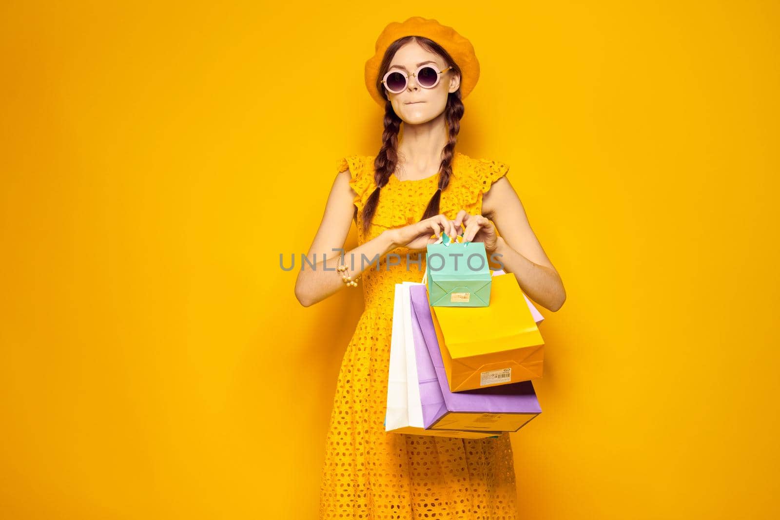 pretty woman wearing sunglasses posing shopping fashion isolated background by Vichizh